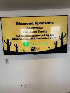 Sign displaying diamond sponsors for an event.