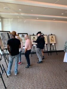 People viewing art in a gallery.